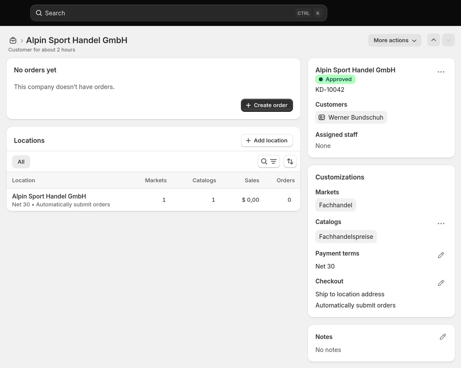 Saved company in the Shopify admin showing status Approved, one location, Net 30 payment terms and the catalog assignment